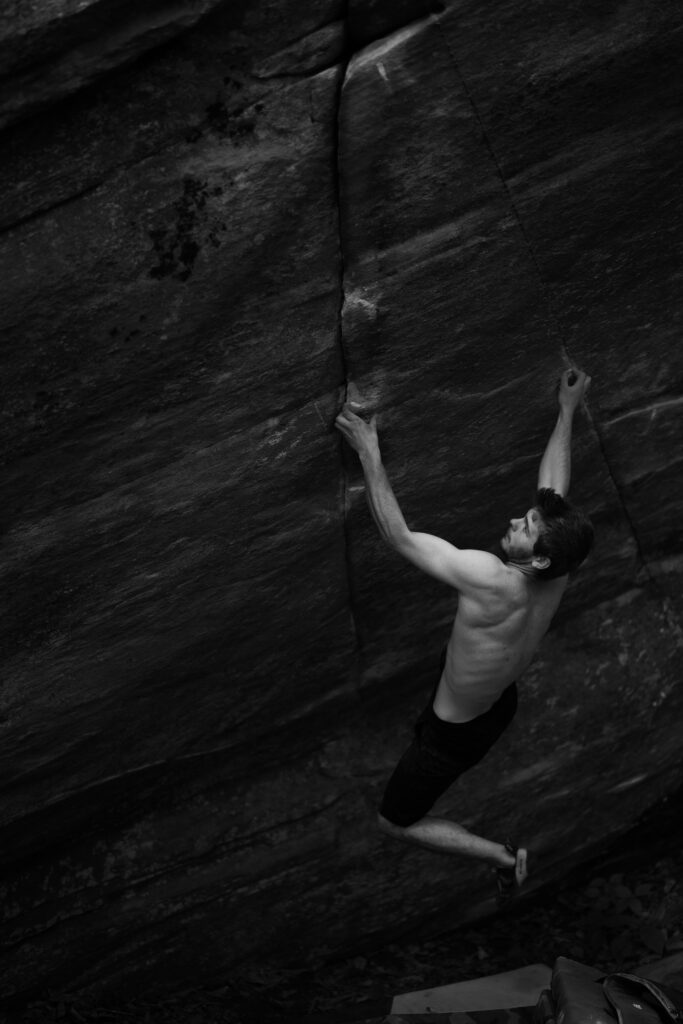 Elijah kiser bouldering in Boone NC